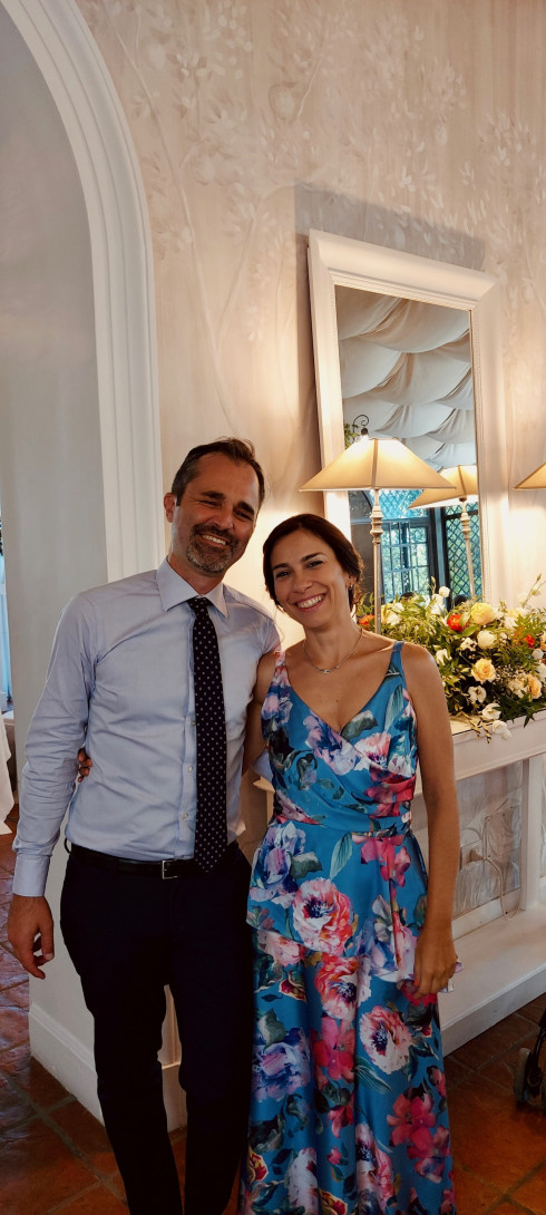 Ricky and Daniella smiling and laughing in between dinner.