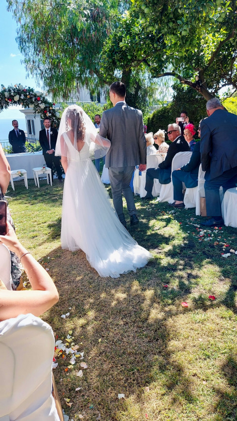 Filly walking down the aisle with Giulio.