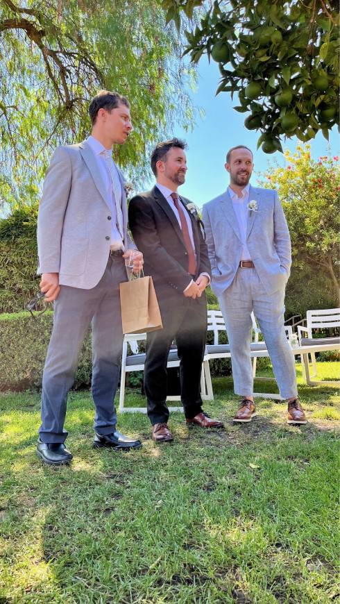 Pete, Jay, and Dave, stand at the front of the ceremony.