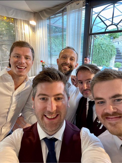 From left to right: Pete, James (holding the selfie camera), Dave, Martin, and Lewis.