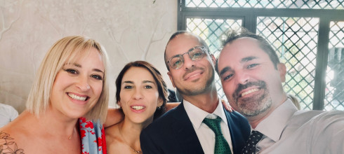 Addy, Daniella, Andrea, and Ricky, smiling at the camera.