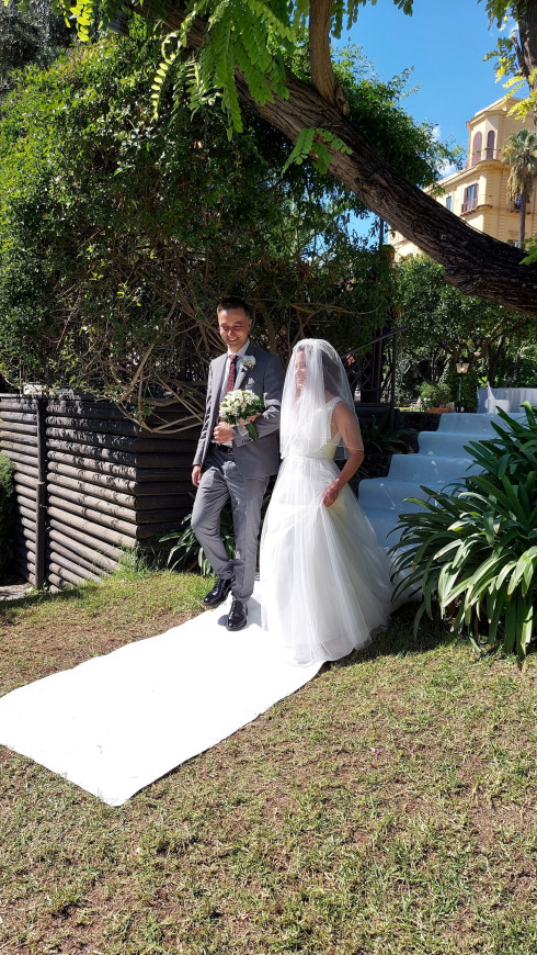 Giulio walking Filly down the aisle.