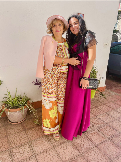 Concetta, Filly's aunt, with Chiara, Concetta's grandaughter in the front garden of the house.