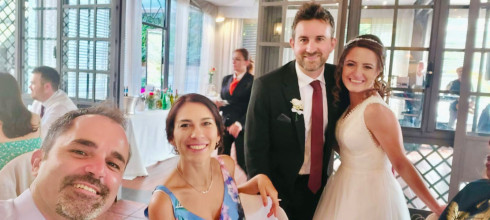 Ricky, Daniella sat down, with Jay and Filly standing behind them smiling.