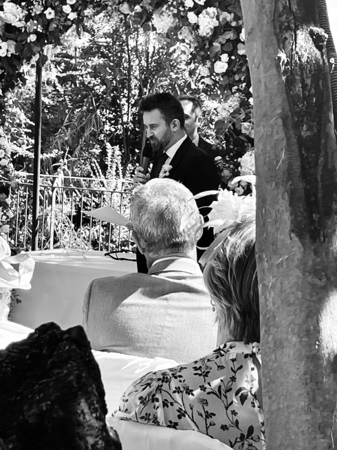 Jay making his speech, with his dad in the foreground.