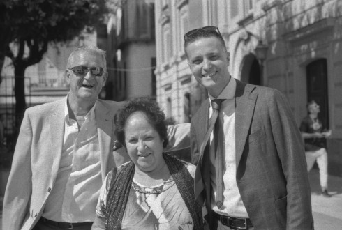 Peter, Angelica, and Giulio outside the town hall in Marigliano.