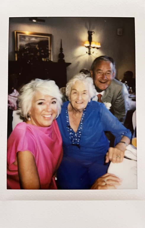 Mum, Grandma, and Dad at the table.